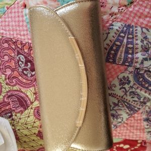 Metallic gold clutch
